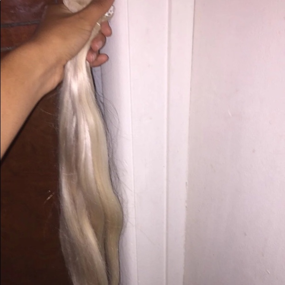 Blonde hair extensions